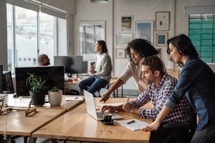 Small business team collaborating in modern office